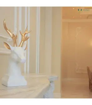 white deer statue