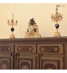 antique candlesticks and desk clock