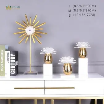 golden and white Decorative Objects